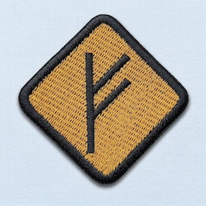May include: A diamond-shaped embroidered patch featuring a golden yellow background with a thick black border. In the center, a black vertical line is intersected by two diagonal lines extending upward and downward to the right.