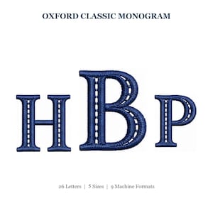 May include: The text OXFORD CLASSIC MONOGRAM appears above the dark blue embroidered letters H, B, and P. Below the letters, the text 26 Letters | 5 Sizes | 9 Machine Formats is displayed. The letters feature a distinct stitched border design.