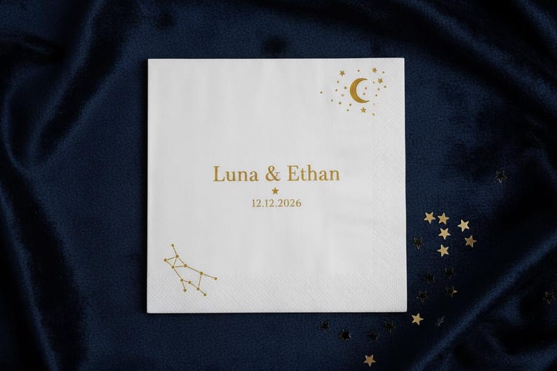 Personalized starry night celestial napkins with custom gold foil moon and stars. White paper cocktail beverage napkins for romantic wedding bar, twinkle little star baby shower, graduation, anniversary birthday party event table decor.