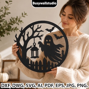 May include: A circular black wall art piece featuring a silhouette design of a ghost, a bare tree, a hanging lantern, a picket fence, and two flying bats. The text Busywallstudio is visible at the top, and DXF, DWG, SVG, AI, PDF, EPS, JPG, PNG at the bottom.