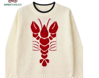 Jersey de punto color crema con estampado de langosta roja, estilo costero preppy.