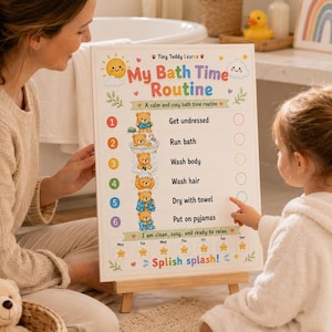 May include: A rectangular white educational chart titled My Bath Time Routine with a Tiny Teddy Learns logo. It features six numbered steps with teddy bear illustrations, checkboxes, and a weekly tracker with star icons and the text Splish splash!
