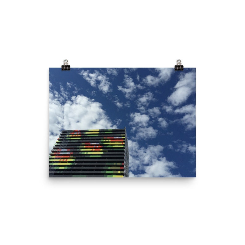 Colorful Building and Bright Blue Sky Poster