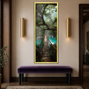 May include: A vertical rectangular wall art piece in a gold frame depicting a wooden rope bridge spanning a vibrant turquoise river within a dense, lush green jungle. The scene features overhanging tree branches and misty forest foliage.