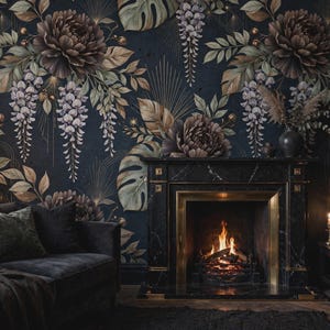 May include: A dark wallpaper featuring large brown peonies, hanging wisteria flowers, and green monstera leaves against a black background with gold geometric line accents. The wallpaper is installed behind a black marble fireplace with a lit fire.