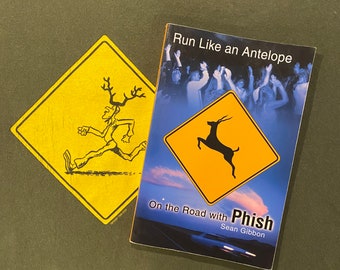 Vintage Jim Pollock Phish "Run Like an Antelope" Olive Green Medium T-shirt from 2003