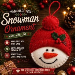 May include: A round, white felt snowman ornament featuring a bright red hat with a matching pom-pom, a stitched orange carrot nose, black eyes, and a black smile. The ornament includes a red hanging loop and is decorated with green holly leaves.