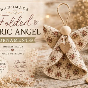 May include: A handmade fabric angel ornament featuring a beige floral print with small red flowers. The angel has a round wooden bead head, a jute twine hanging loop, and a small wooden heart accent on the front. Text reads HANDMADE FOLDED FABRIC ANGEL ORNAMENT.