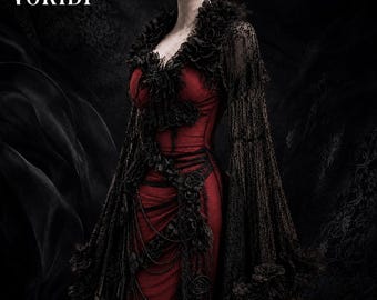 May include: A floor-length dress featuring a deep red bodice and skirt, accented with black lace sleeves and black fabric rose embellishments. The garment includes a V-neckline, draped black chains, and the text VORIBI printed in the upper left corner.