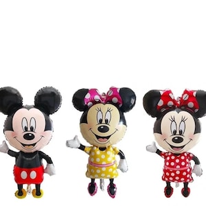 May include: Three foil balloons shaped like cartoon characters. The left balloon is a black, white, and red mouse character in shorts. The middle balloon is a mouse character with a pink bow and yellow polka-dot dress. The right balloon has a red polka-dot dress.