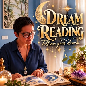 May include: A person with short dark hair and glasses reads an open book with celestial illustrations. The text DREAM READING Tell me your dream is displayed in gold lettering. A lit candle, a lantern, and a purple crystal cluster are present.
