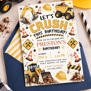 May include: A rectangular birthday invitation card featuring construction-themed illustrations including yellow excavators, dump trucks, hard hats, traffic cones, and piles of dirt. The text reads: LET'S CRUSH THIS BIRTHDAY! JOIN US TO CELEBRATE PRESTON'S BIRTHDAY! SATURDAY JUNE 15 AT 2:00 PM 1234 CONSTRUCTION WAY FORT WORTH, TX 76107 RSVP TO KATIE 123.456.7890.