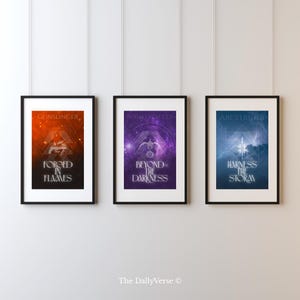 May include: Three framed wall art prints featuring gaming themes. The left print is orange with the text Gunslinger Forged In Flames. The middle print is purple with the text Nightstalker Beyond The Darkness. The right print is blue with the text Arcstrider Harness The Storm.