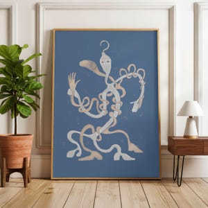 May include: A framed wall art print featuring a light beige, abstract, multi-limbed creature with a single eye and a hook-shaped head, set against a solid blue background. The creature has elongated, winding limbs and a hand-like appendage.