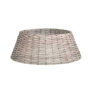 May include: A tapered, circular tree collar constructed from woven light grey and tan natural fibres. The structure features a consistent horizontal weave pattern with a wide base that narrows towards the top opening, creating a hollow, truncated cone shape.