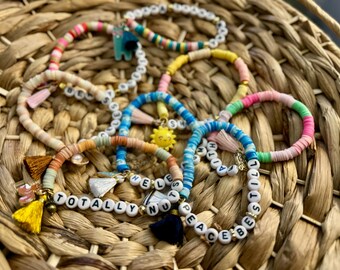 Handmade Clay Bead Bracelet with Charm & Tassel | Stretch Bracelet