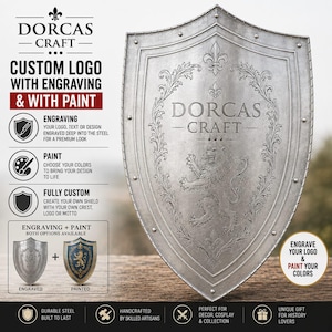 May include: A silver-colored steel shield featuring an engraved lion emblem and the text DORCAS CRAFT. The shield is surrounded by a decorative border with fleur-de-lis accents. Text on the left details custom engraving and paint options.