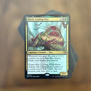 May include: A Magic: The Gathering trading card titled Blech, Loafing Pest, featuring a green and purple spiky creature illustration. The card text includes the ability to add +1/+1 counters and flavour text about Witherbloom students.