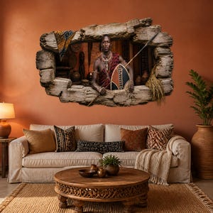 May include: A wall decal featuring a 3D-style hole in a stone wall, revealing a portrait of a warrior holding a spear and a patterned shield. The warrior wears traditional red and black garments with beaded necklaces in a dimly lit interior setting.