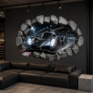 May include: A wall decal featuring a dark gray race car driving on a track at night, framed by a 3D-effect hole in a concrete wall. The car has bright white headlights and red wheel accents, creating a dynamic scene on a dark gray wall.