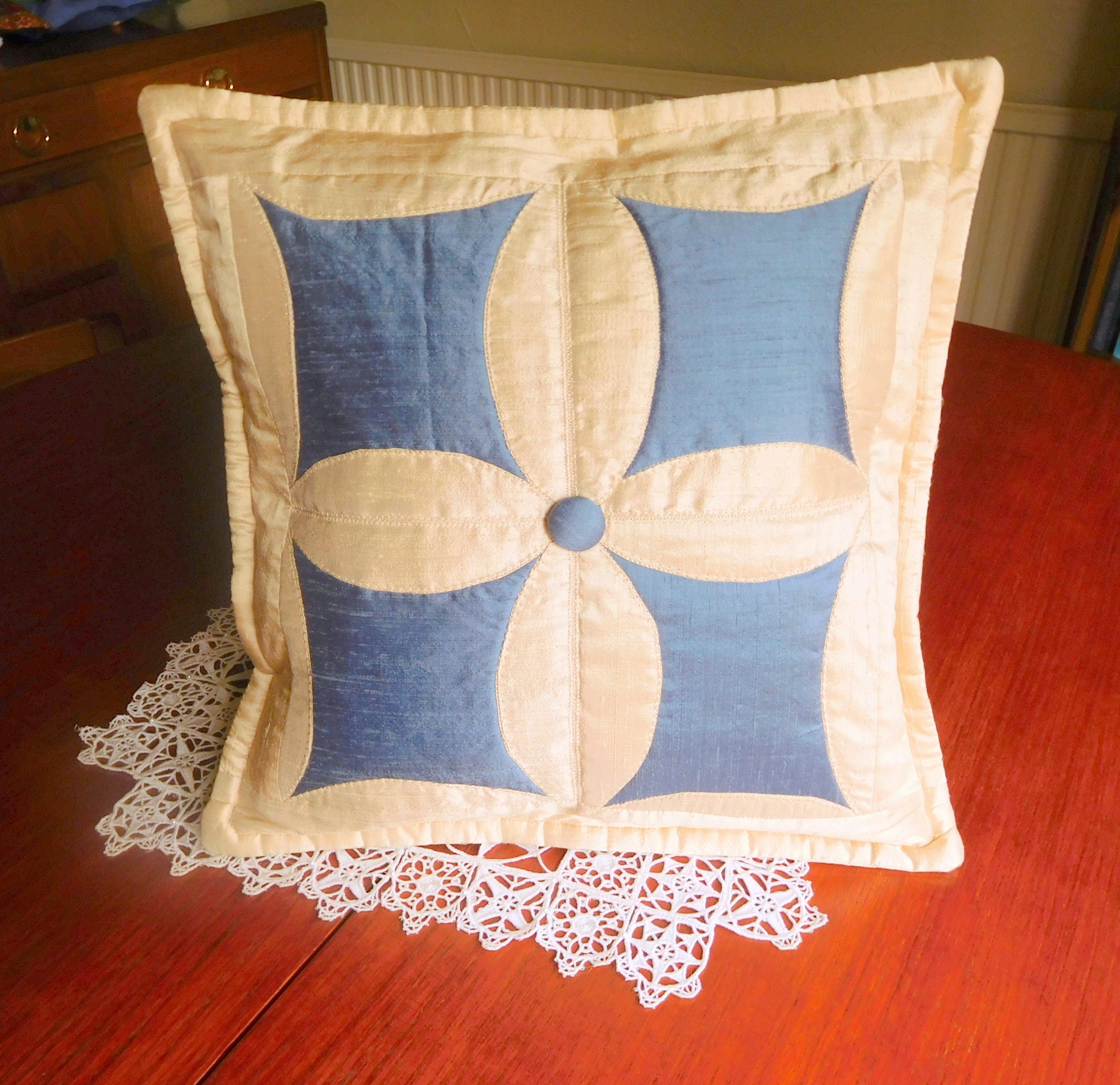 cathedral window patchwork cushion
