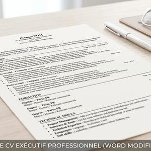 May include: A white resume template printed on paper with black text, featuring sections for experience, education, and technical skills. A silver pen and clear-framed eyeglasses are placed next to the document on a light-colored wooden surface.