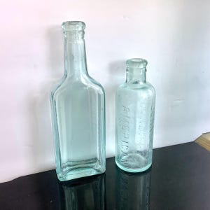Fletcher’s Castoria & Johnson&#39;s American Anodyne Liniment, Lot of 2 Antique Aqua Patent Medicine Bottles