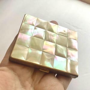 May include: A set of three ceramic mugs with a speckled, matte finish. The mugs are in shades of cream, light gray, and dark gray. Each mug has a simple, minimalist design, perfect for coffee or tea.