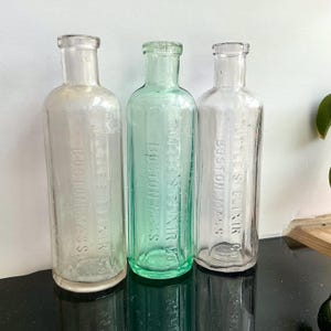 Choose 1 Tuttle&#39;s Elixir Veterinary Medicine, Antique Glass Nostrum Bottle