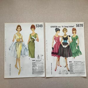 May include: Two vintage McCall's printed sewing pattern sheets, numbered 5349 and 5670. Each sheet features color illustrations of dresses with various silhouettes, including full skirts and sheath styles, alongside detailed sizing charts and text.