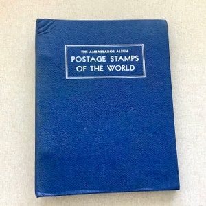 WORLDWIDE STAMP COLLECTION IN H. E. HARRIS AMBASSADOR ALBUMS 2 lot