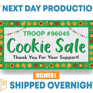 May include: Green banner with a white background and a border of colorful cookies. The banner reads "TROOP #96045 Cookie Sale Thank You For Your Support!" with a string of colorful flags above the text.