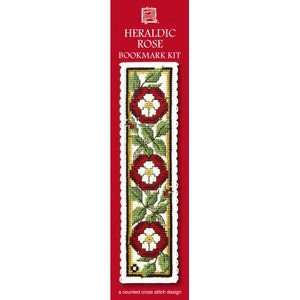 May include: A counted cross stitch bookmark kit featuring a heraldic rose design. The bookmark is white with a red, green, and yellow floral pattern. The kit includes all the materials needed to complete the project.