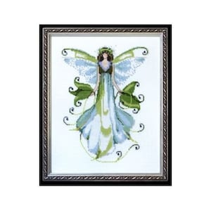 May include: A cross-stitch embroidery of a fairy with blue and green wings and a white dress. The fairy is surrounded by green vines and flowers.