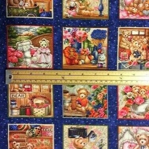 May include: A blue fabric with a repeating pattern of teddy bears in various scenes. The scenes include a teddy bear shop, a teddy bear picnic, a teddy bear nursery, and a teddy bear garden. The fabric is perfect for quilting, crafts, and home decor.