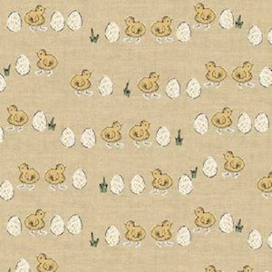 May include: A beige fabric with a repeating pattern of yellow chicks and white eggs. The chicks are walking in a line and the eggs are scattered around them.