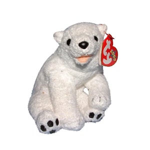 May include: White plush polar bear sitting with a red Beanie Baby tag that says "Ty 2000" on it.