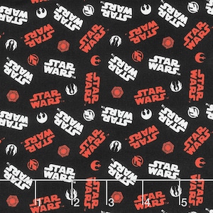 May include: Black fabric with a repeating pattern of the Star Wars logo in white and red. The logo includes the text "Star Wars" and the trademark symbol. The fabric is 38 cm wide.