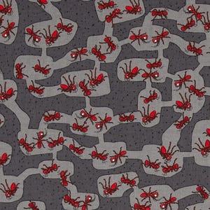 May include: A gray and red fabric with a repeating pattern of ants walking in a maze. The ants are red with black eyes and legs. The maze is gray with a speckled texture.