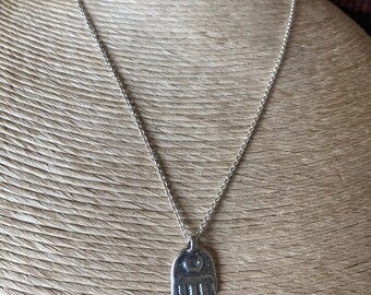 cast Hamsa pendant