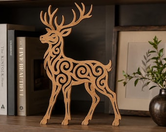 May include: A freestanding wooden deer figurine featuring an intricate laser-cut scrollwork pattern throughout its body and antlers. The deer is depicted in profile, standing on four legs with a light brown wood grain finish and smooth edges.