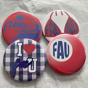 May include: Four circular pin-back buttons with various designs. One is red with blue text reading Florida, one is white with a red owl graphic and text reading FAU OWLS, one features a blue and white plaid pattern with I heart FAU, and one is red with blue text reading FAU.