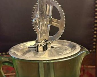Vintage Green Handled Beater with measuring jar