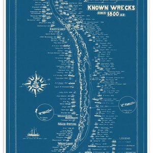 May include: A blue nautical map titled Sable Island Graveyard of the Atlantic Known Wrecks Since 1800 AD. The print features a central island outline surrounded by numerous ship icons, names, dates, a compass rose, and a legend detailing ship types.