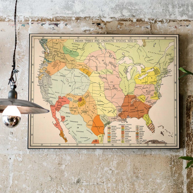 May include: A vintage map of the United States showing the locations of Native American tribes and linguistic stocks in 1650. The map is color-coded by tribe and includes a key to the different linguistic stocks.