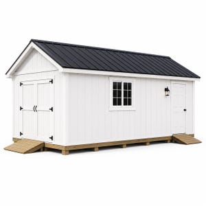 May include: A rectangular white shed with vertical siding and a black metal gable roof. It features double doors with black hinges, a single side door, a window with white trim, and a black wall-mounted light fixture. Two wooden ramps lead to the doors.