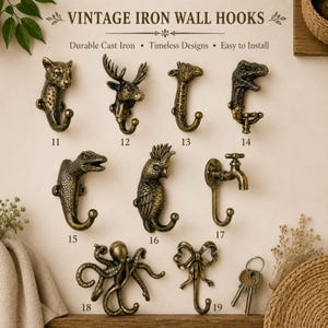 Puede incluir: Una colección de nueve ganchos de pared de hierro fundido de estilo antiguo numerados del 11 al 19, con diseños de leopardo, alce, jirafa, dinosaurio, lagarto, loro, grifo, pulpo y lazo, con el texto VINTAGE IRON WALL HOOKS.