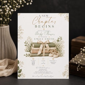 May include: A white baby shower invitation card featuring the text A NEW CHAPTER BEGINS, HONORING EMILY SMITH, with an illustration of a stack of three books tied with a beige ribbon, a pair of baby shoes, and white floral accents on the sides.