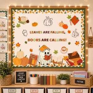 May include: A rectangular bulletin board with a wooden frame and string lights, featuring the text LEAVES ARE FALLING, BOOKS ARE CALLING. The board displays illustrations of pumpkins, books, a ghost reading, and autumn leaves on a white background.