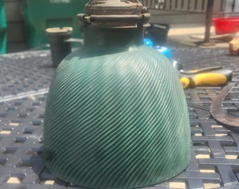 Vintage röntgenglas van kwikglas uit de jaren 1920 met groene buitenkant.